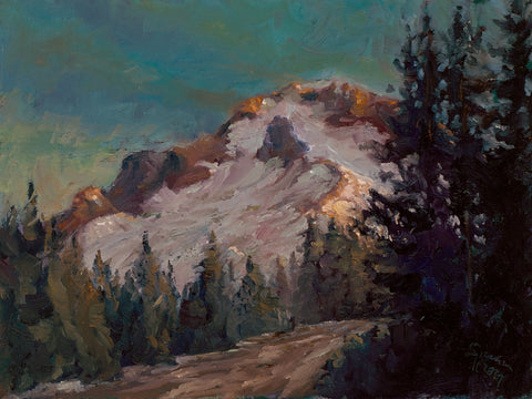 First light behind the mountain